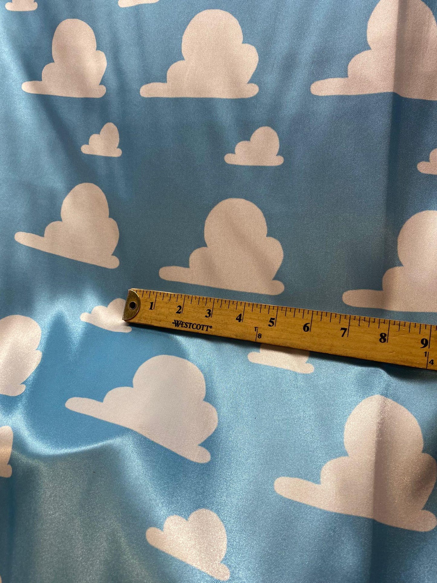 Toy Story Cloud Print Toss on Satin Fabric – 100% Polyester, 58″ Wide | Gtex Fabrics