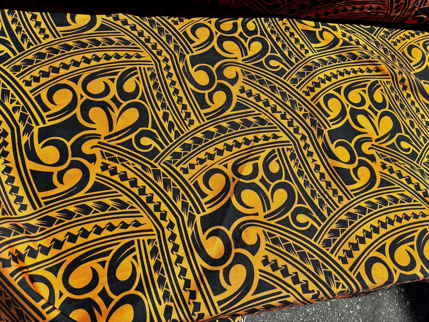 Island Fabric - Polynesian Tribal Fabric β 100% Polyester MiniMatt β Made in New Zealand 60β Wide (Orange and Black) | Gtex Fabrics