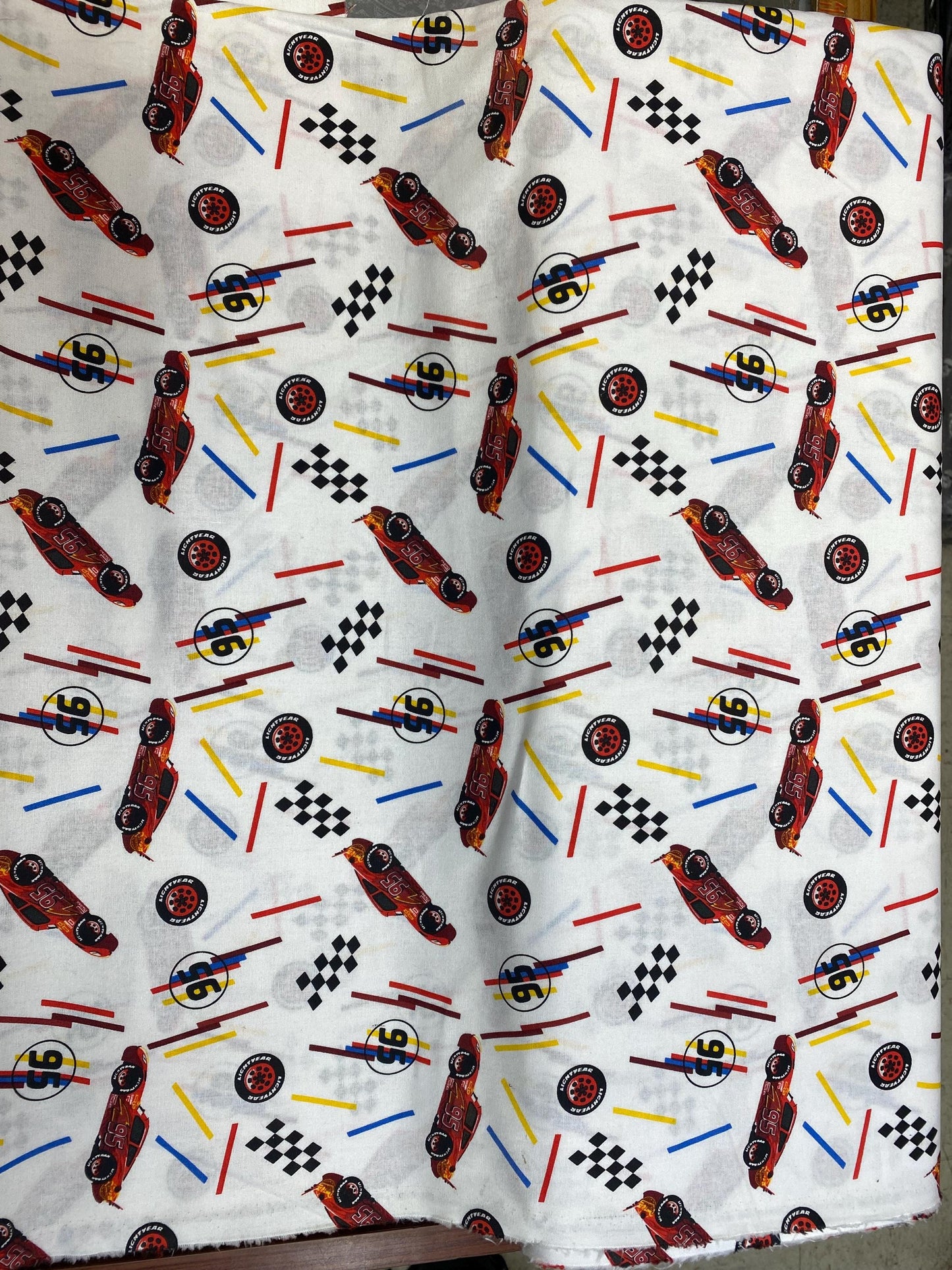 Disney Cars Fabric - Lightning McQueen Tires Toss - 100% Cotton - 43โ Wide - Sold by the Yard - Kids Quilting & Crafts Material | Gtex Fabrics