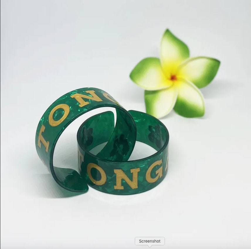 Tonga Bracelet, Bangle, Jewelry, Acrylic Resin Tortoise Shell Material With Hibiscus Flowers, Engraved Letters, Polynesian Design | Gtex Fabrics