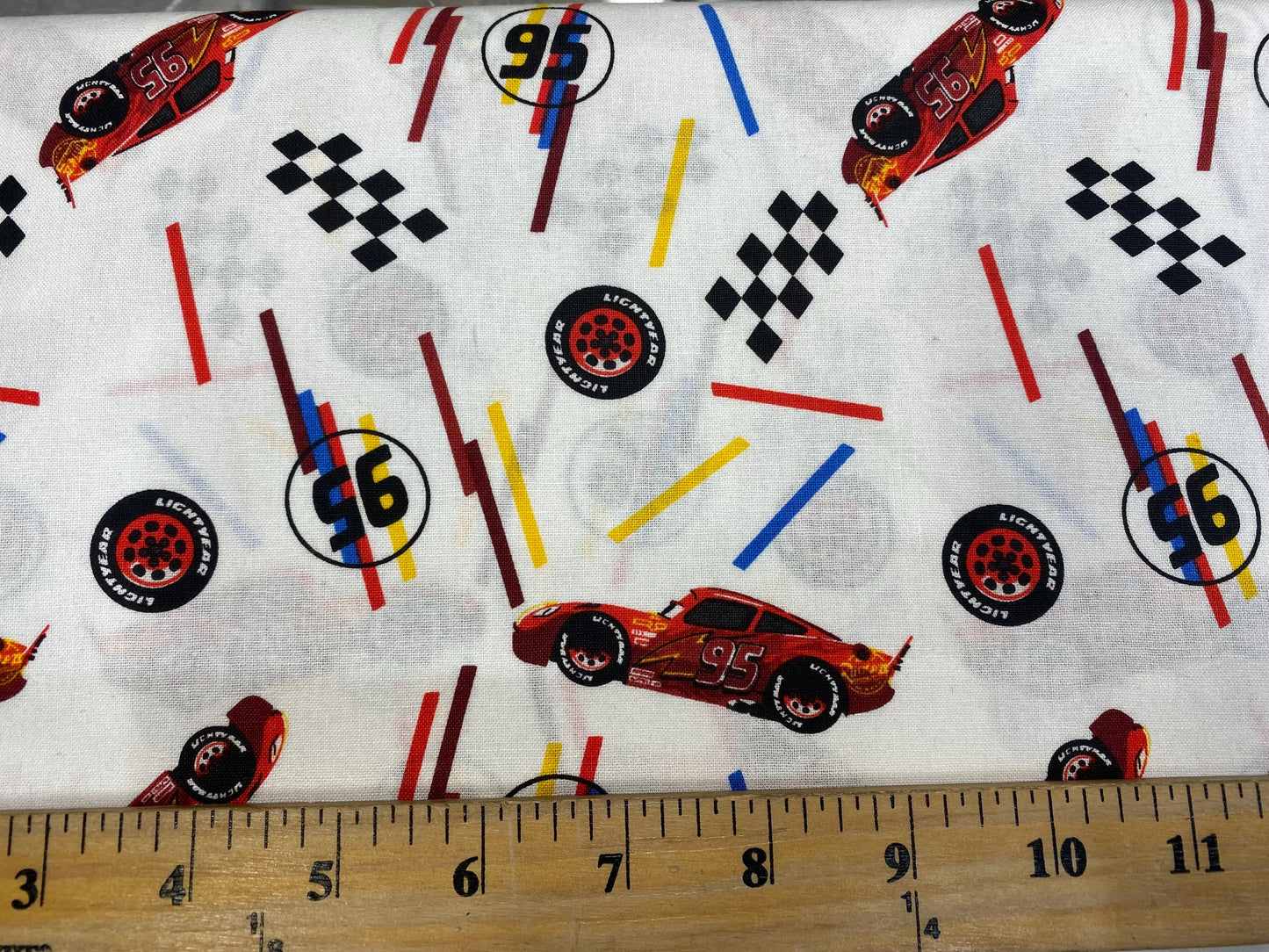 Disney Cars Fabric - Lightning McQueen Tires Toss - 100% Cotton - 43” Wide - Sold by the Yard - Kids Quilting & Crafts Material  | Gtex Fabrics