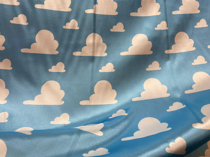 Toy Story Cloud Print Toss on Satin Fabric – 100% Polyester, 58″ Wide | Gtex Fabrics