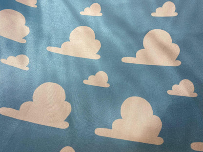 Toy Story Cloud Print Toss on Satin Fabric – 100% Polyester, 58″ Wide | Gtex Fabrics
